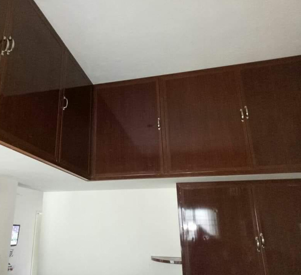 loft covering storage design by Nakshatra Interiors